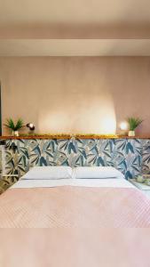 Ένα ή περισσότερα κρεβάτια σε δωμάτιο στο B&B Popoli Terme