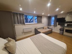 Postel nebo postele na pokoji v ubytování The City Collection