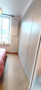 Ένα ή περισσότερα κρεβάτια σε δωμάτιο στο Le Ptit Rennes- 200 m de la Gare Cosy Lumineux