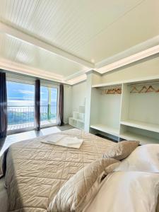 Postel nebo postele na pokoji v ubytování Hera House, Ponta do Sol, Portugal