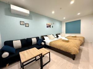 Giường trong phòng chung tại Grandioso Okinawa Villa Kin 2 - Vacation STAY 90150v +48 ảnh