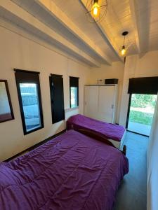 En eller flere senge i et værelse på Casa 109 + 9 billeder