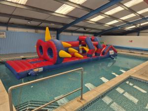a swimming pool with a inflatable antidepressricularricularricularricularricularricularricularricular at Terri Towers in Stevenston