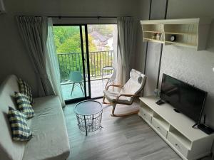 Χώρος καθιστικού στο Апартаменты Пхукет