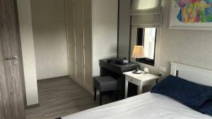 Ένα ή περισσότερα κρεβάτια σε δωμάτιο στο Апартаменты Пхукет