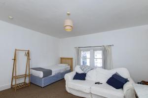 Voodi või voodid majutusasutuse Montague House Apartments toas +3 fotot