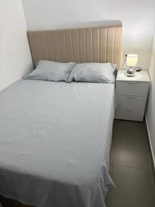 Ένα ή περισσότερα κρεβάτια σε δωμάτιο στο MIRAMAR V