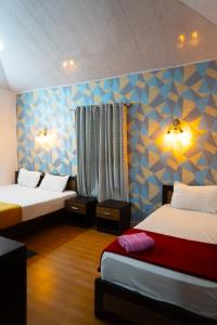 Ένα ή περισσότερα κρεβάτια σε δωμάτιο στο Little Bricks Reverside Villa by GreenEscapes