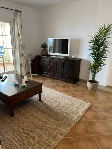 TV a/nebo společenská místnost v ubytování Vista Marina de Isla Canela