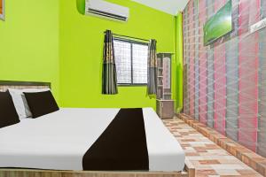 Ένα ή περισσότερα κρεβάτια σε δωμάτιο στο Hotel O New Shan-e-Punjab Veer Restaurant and lodging +21 φωτογραφίες