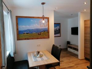 Μια τηλεόραση ή/και κέντρο ψυχαγωγίας στο Appartement Holaus