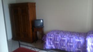 TV a/nebo společenská místnost v ubytování Agriturismo La Palombara