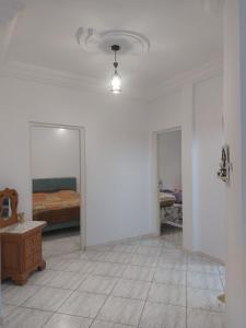 Una cama o camas en una habitación de Location saisonnière entre mer, forêt et calme