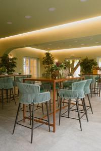 a dining room with a table and chairs at La Meirana in Gavi +27 photos