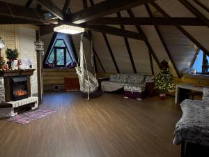 a room with a tent with a christmas tree in it at Lavender House in Slavske