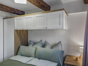 Ένα ή περισσότερα κρεβάτια σε δωμάτιο στο Objekt-Nr 242 - Hafen - Kurgartenstraße