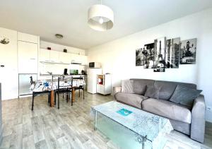 Kuchyň nebo kuchyňský kout v ubytování Agréable appartement au centre de La Teste