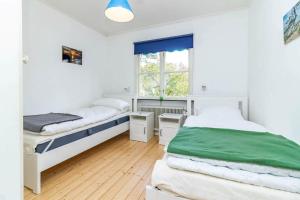 Giường trong phòng chung tại KAL871-Fagelsfors-Adalsvaegen-3