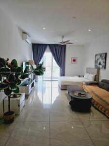 Una cama o camas en una habitación de Quill Residence Kuala Lumpur by PN 69 fotos más