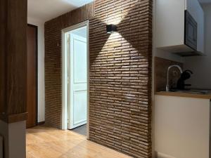 Kuchyň nebo kuchyňský kout v ubytování Anxur Apartment