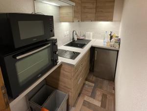 Η κουζίνα ή μικρή κουζίνα στο Charming Apartment au pied des pistes