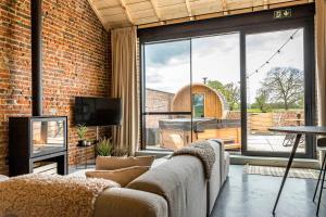 TV a/nebo společenská místnost v ubytování De Hoeveschuur