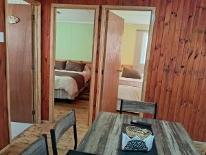 Postel nebo postele na pokoji v ubytování Cabañas Frange 2