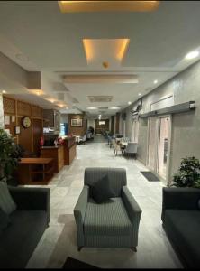 Χώρος καθιστικού στο Hôtel EDHIAFA