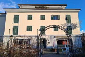 an archway in front of a building at Sarzana Park Hotel in Sarzana