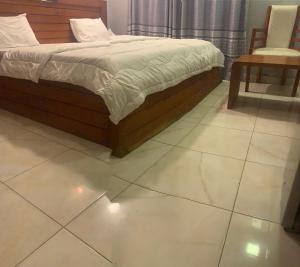 Postel nebo postele na pokoji v ubytování NBS Hotel + 6 fotografií