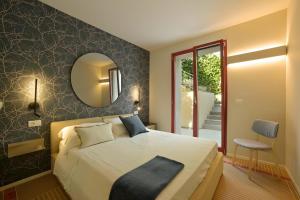 Ένα ή περισσότερα κρεβάτια σε δωμάτιο στο Saint Claude