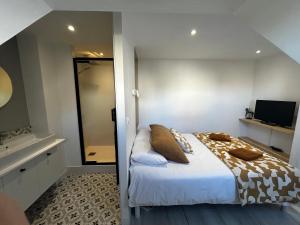 Ένα ή περισσότερα κρεβάτια σε δωμάτιο στο Rance Solidor