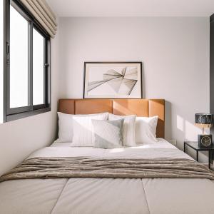 Ένα ή περισσότερα κρεβάτια σε δωμάτιο στο Chic Condo at VIP great hill Near Phuket Airport