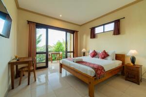 Ένα ή περισσότερα κρεβάτια σε δωμάτιο στο Pondok Ayu Soca Ubud +90 φωτογραφίες