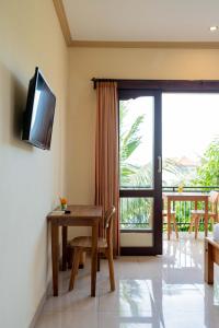 Μια τηλεόραση ή/και κέντρο ψυχαγωγίας στο Pondok Ayu Soca Ubud