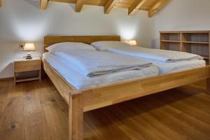 Ένα ή περισσότερα κρεβάτια σε δωμάτιο στο Ferienwohnung Paula