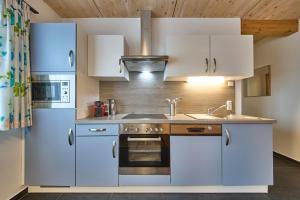 Η κουζίνα ή μικρή κουζίνα στο Ferienwohnung Paula