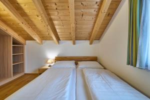 Ένα ή περισσότερα κρεβάτια σε δωμάτιο στο Ferienwohnung Paula