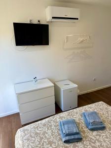Postel nebo postele na pokoji v ubytování Albufeira Solmare Suites