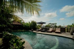 Πισίνα στο ή κοντά στο Pondok Ayu Soca Ubud