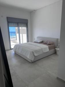 Postel nebo postele na pokoji v ubytování La Mer