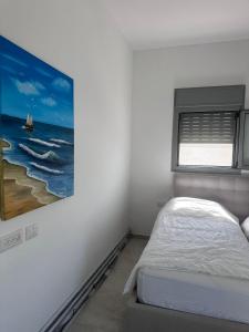 Postel nebo postele na pokoji v ubytování La Mer