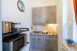 Køkken eller tekøkken på Schloss Hohenzollern - Wohnung 15