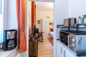 Køkken eller tekøkken på Schloss Hohenzollern - Wohnung 15