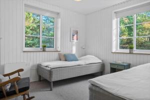 Ένα ή περισσότερα κρεβάτια σε δωμάτιο στο 2553-Romo-P-S-Carlsvej-10