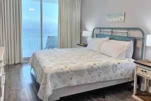 Ένα ή περισσότερα κρεβάτια σε δωμάτιο στο Island Tower 2002