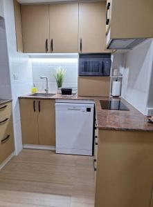 Köök või kööginurk majutusasutuses Jomtien Plaza Condotel