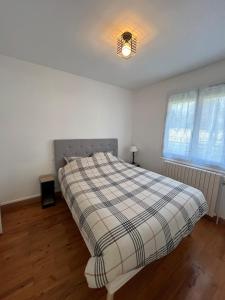 Postel nebo postele na pokoji v ubytování Le Margotin