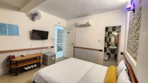 Μια τηλεόραση ή/και κέντρο ψυχαγωγίας στο Ngoc Son Hotel