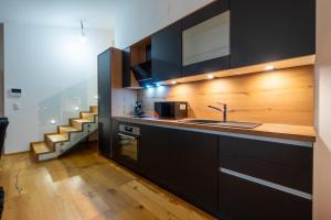 Η κουζίνα ή μικρή κουζίνα στο Bennett Apartment